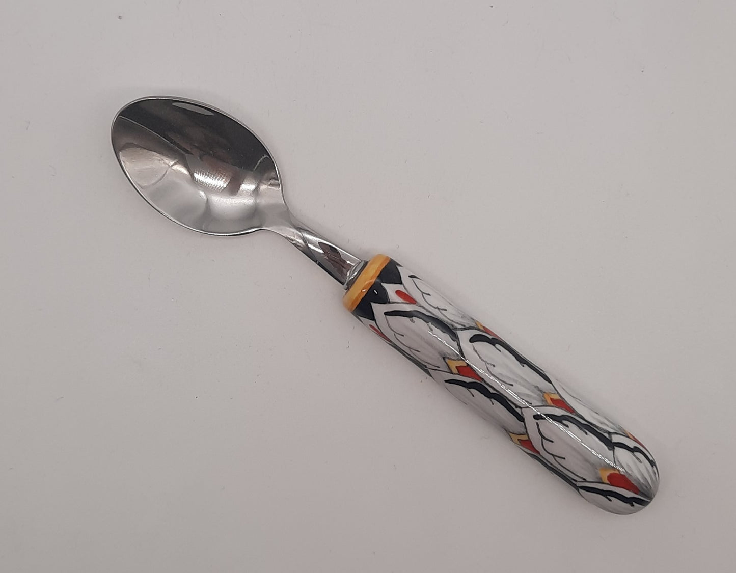Cucchiaino da dolce da tavola Decoro VFN. Manico in ceramica dipinto a mano, cucchiaio in acciaio inox.