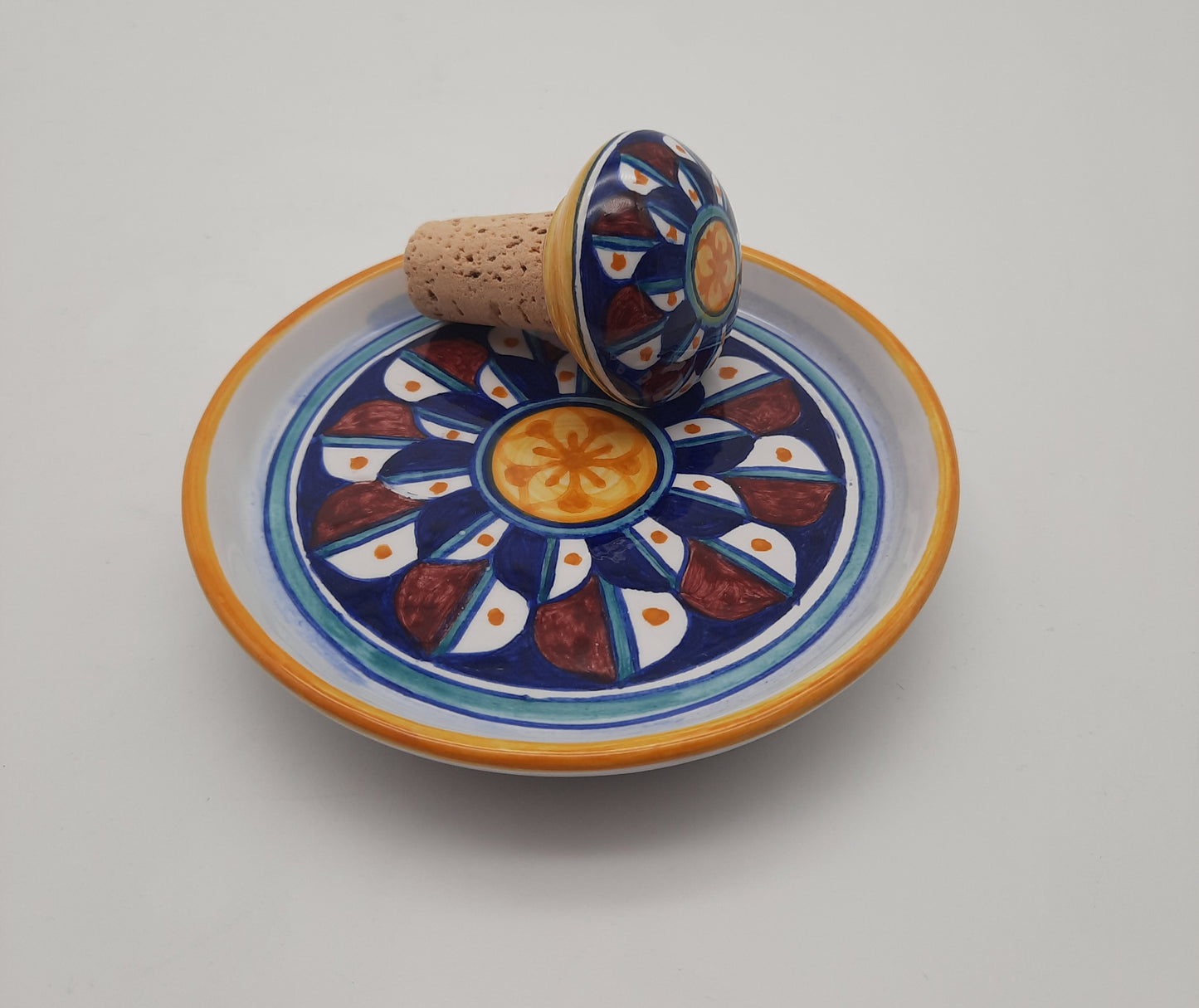 Bottle coaster with cap